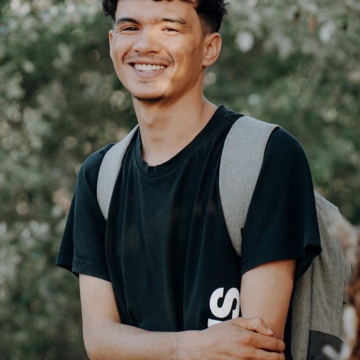 Kaveri Mehta, Lead Design Curator at UrbanThreadMap, reviewing corporate floral arrangements